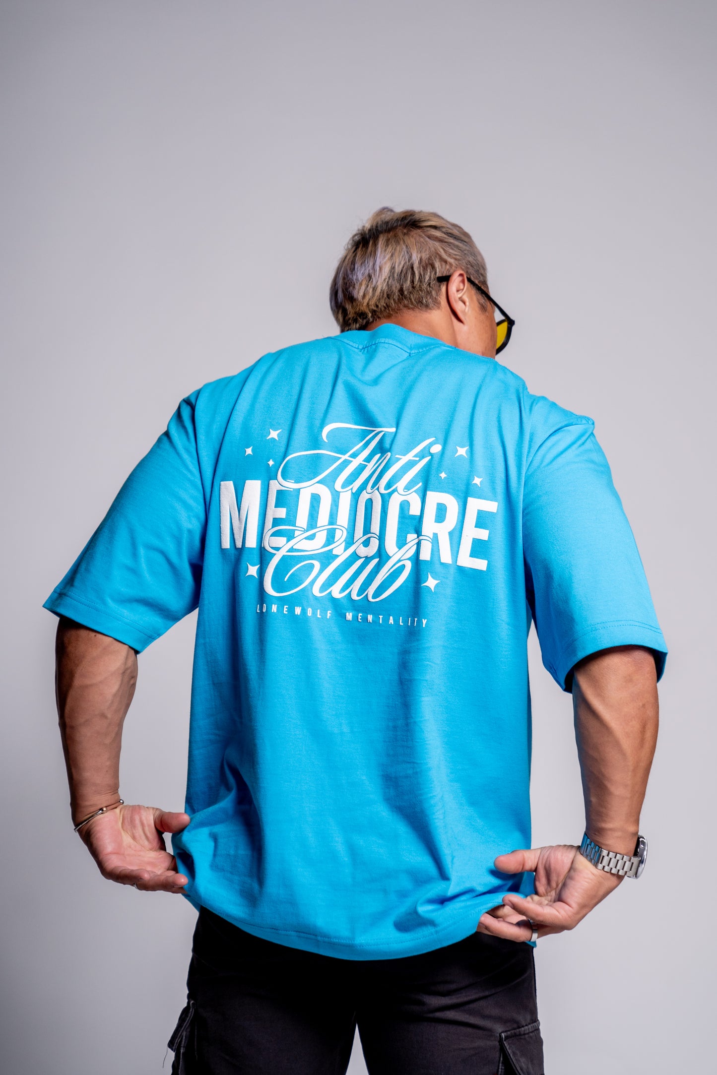 ANTI-MEDIOCRE CLUB OVERSIZED TEE CYAN BLUE