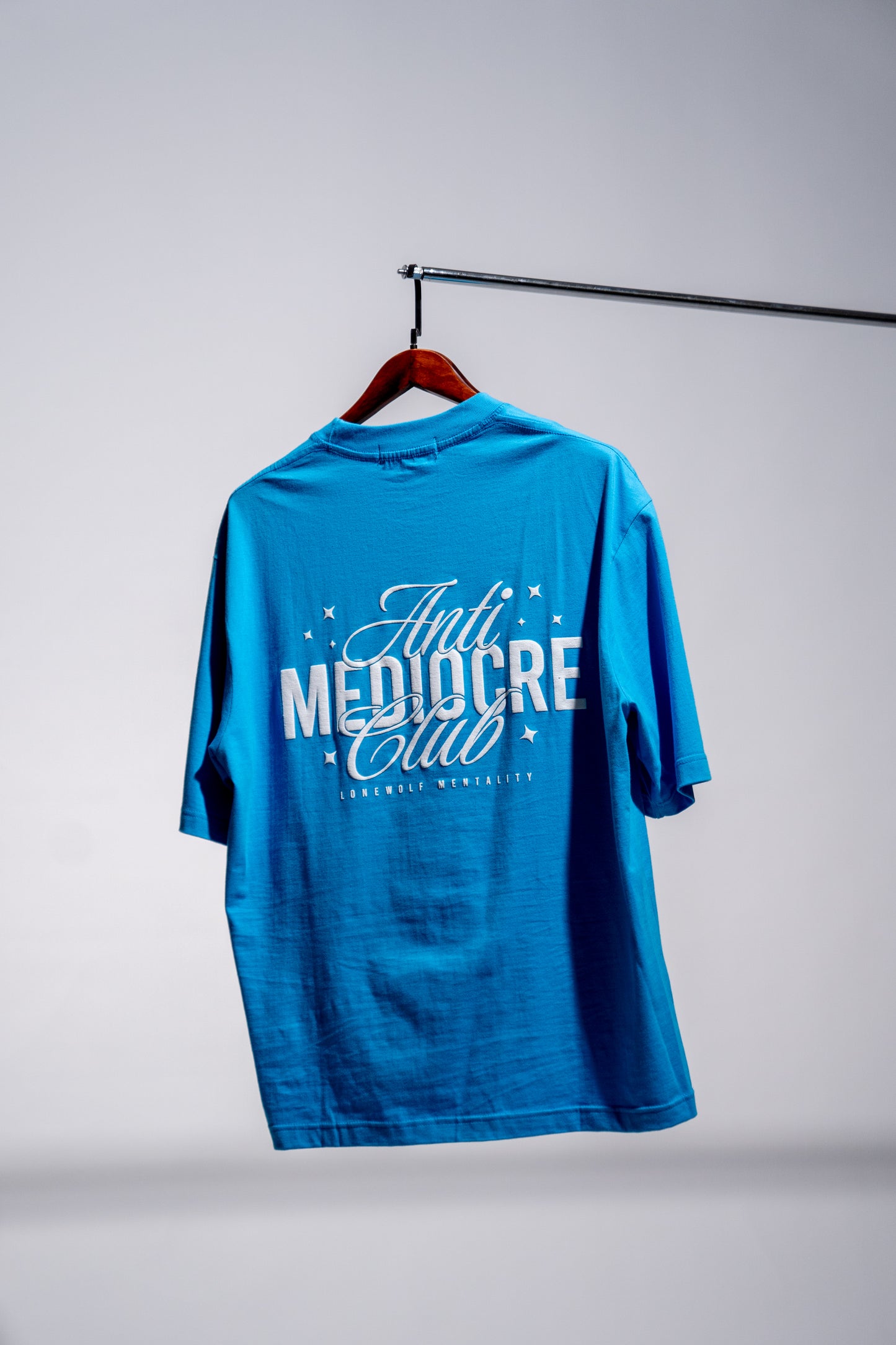 ANTI-MEDIOCRE CLUB OVERSIZED TEE CYAN BLUE