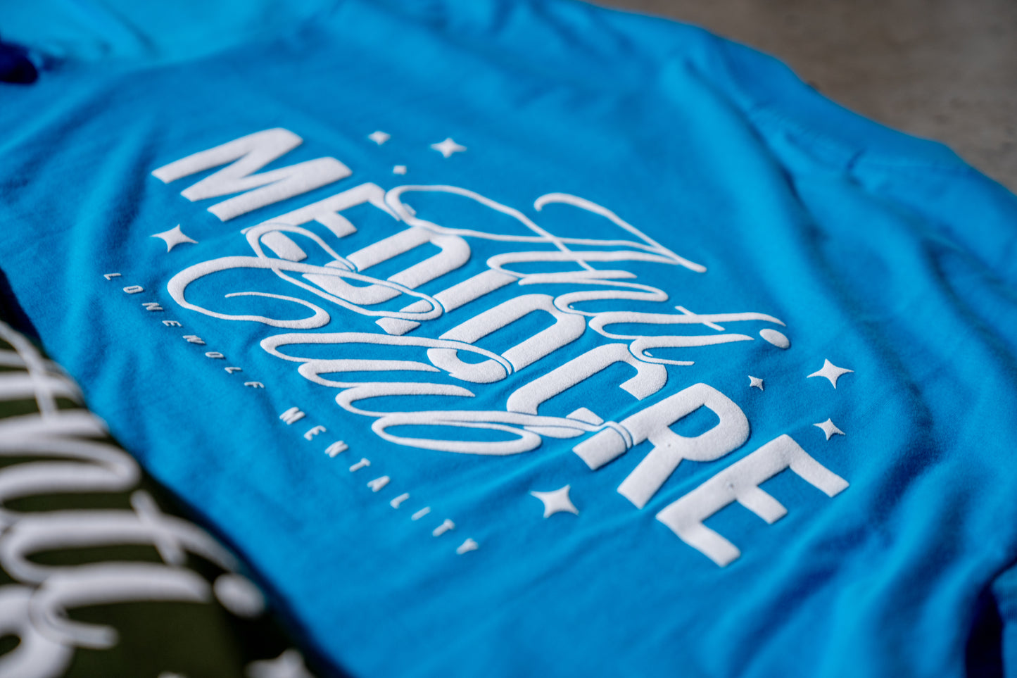 ANTI-MEDIOCRE CLUB OVERSIZED TEE CYAN BLUE
